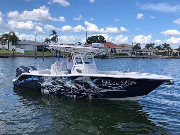 Custom designed boat wraps by Marine Wraps in Miami, enhancing appearance and protection.