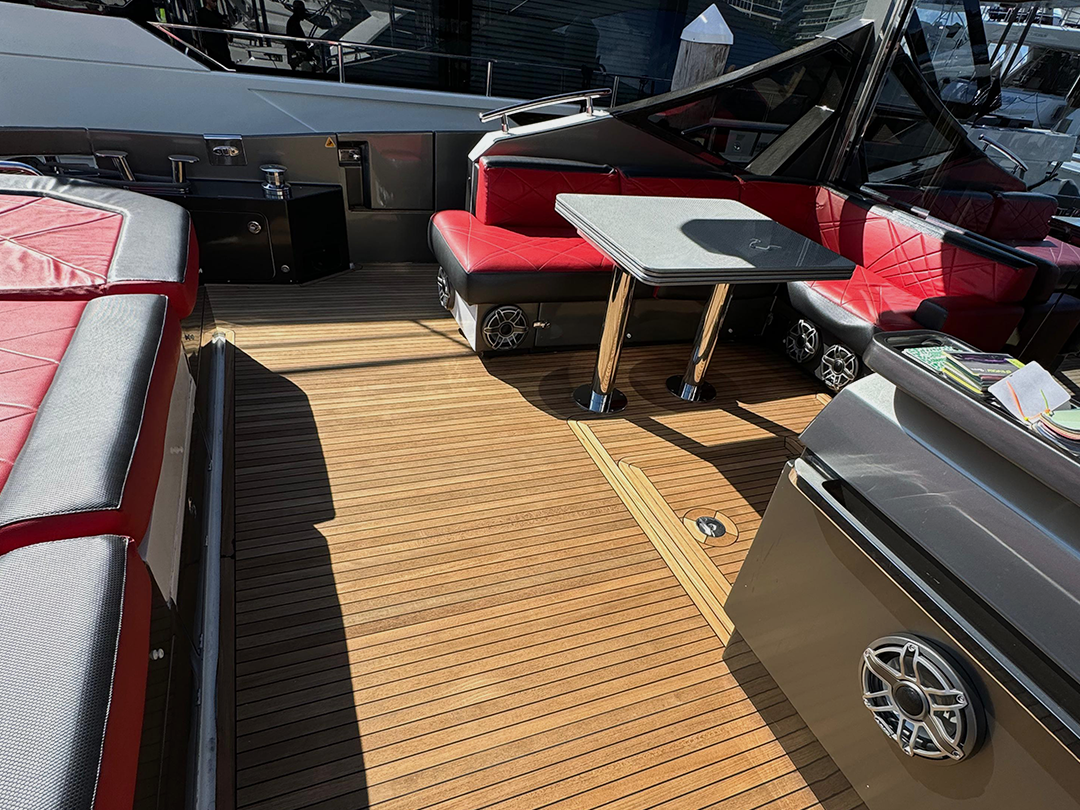 Professional teak restoration and maintenance by Marine Wraps for Miami luxury boat.