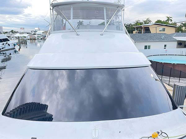 UV-resistant window tint applied to boat windows by Marine Wraps in Miami.